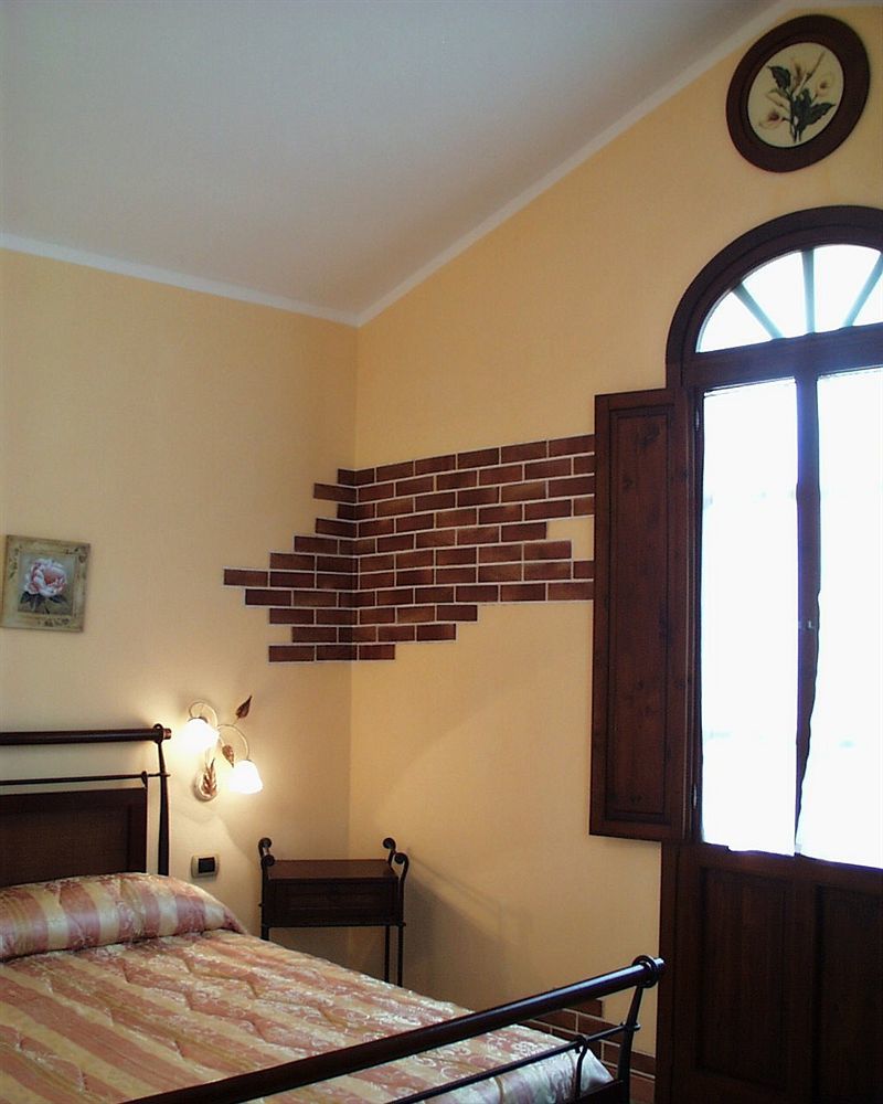 Hotel La Corte Rosada Villasimius Exterior photo